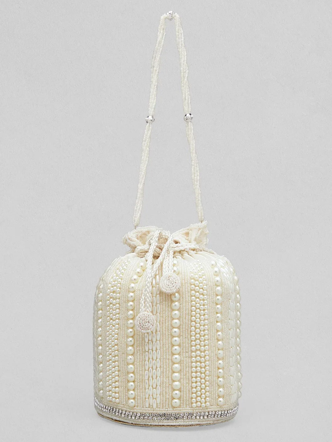 Rubans Off White Colour Potli Bag With Studded With Pearls Design.